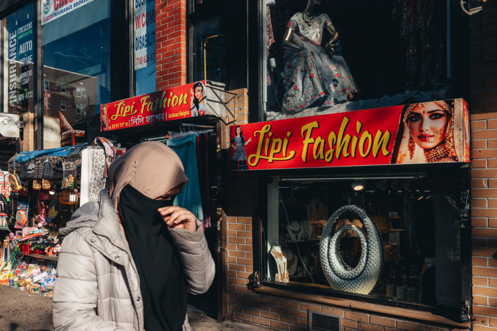 Lipi Fashion, Jackson Heights, Queens
A brief pause outside a shop window.